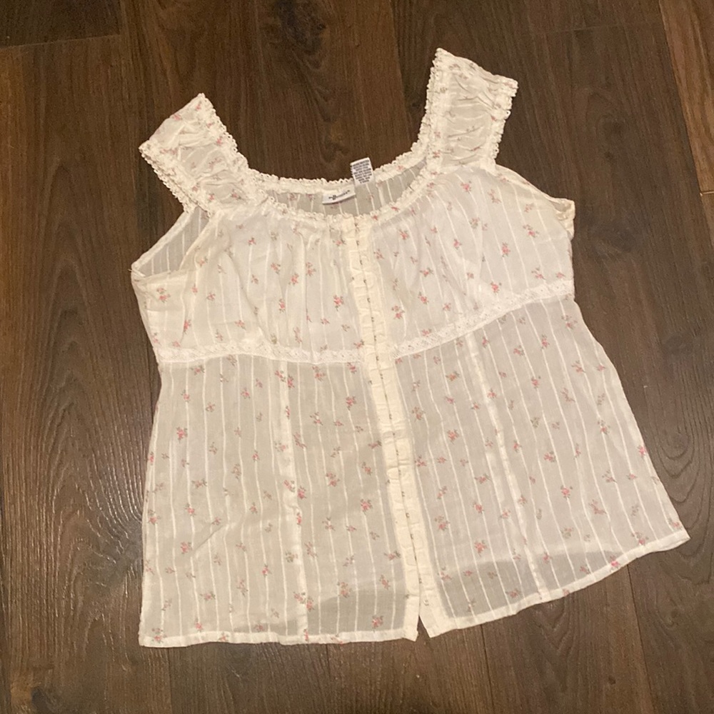 White top with small pink flowers